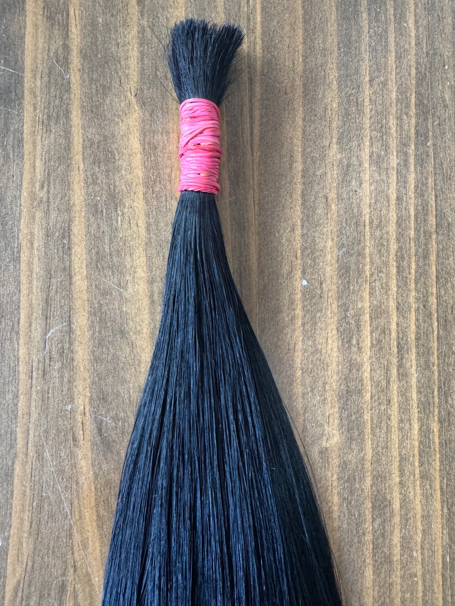 Moño Negro Delhi 50 gr 20”